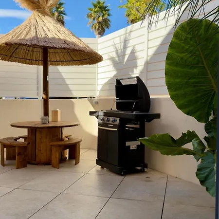 Evasion Jardin, Parking Privé Gratuit, Climatisé, Wi-fi, à 5mn Plage, Confort Appartamento